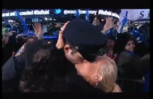 Jenny McCarthy kissing a cop